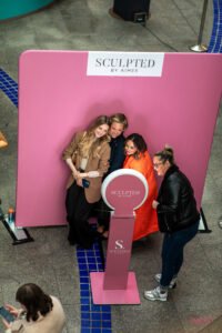 The Mobi Aura booth set up at a corporate event taking photos of guests - Corporate photo booth